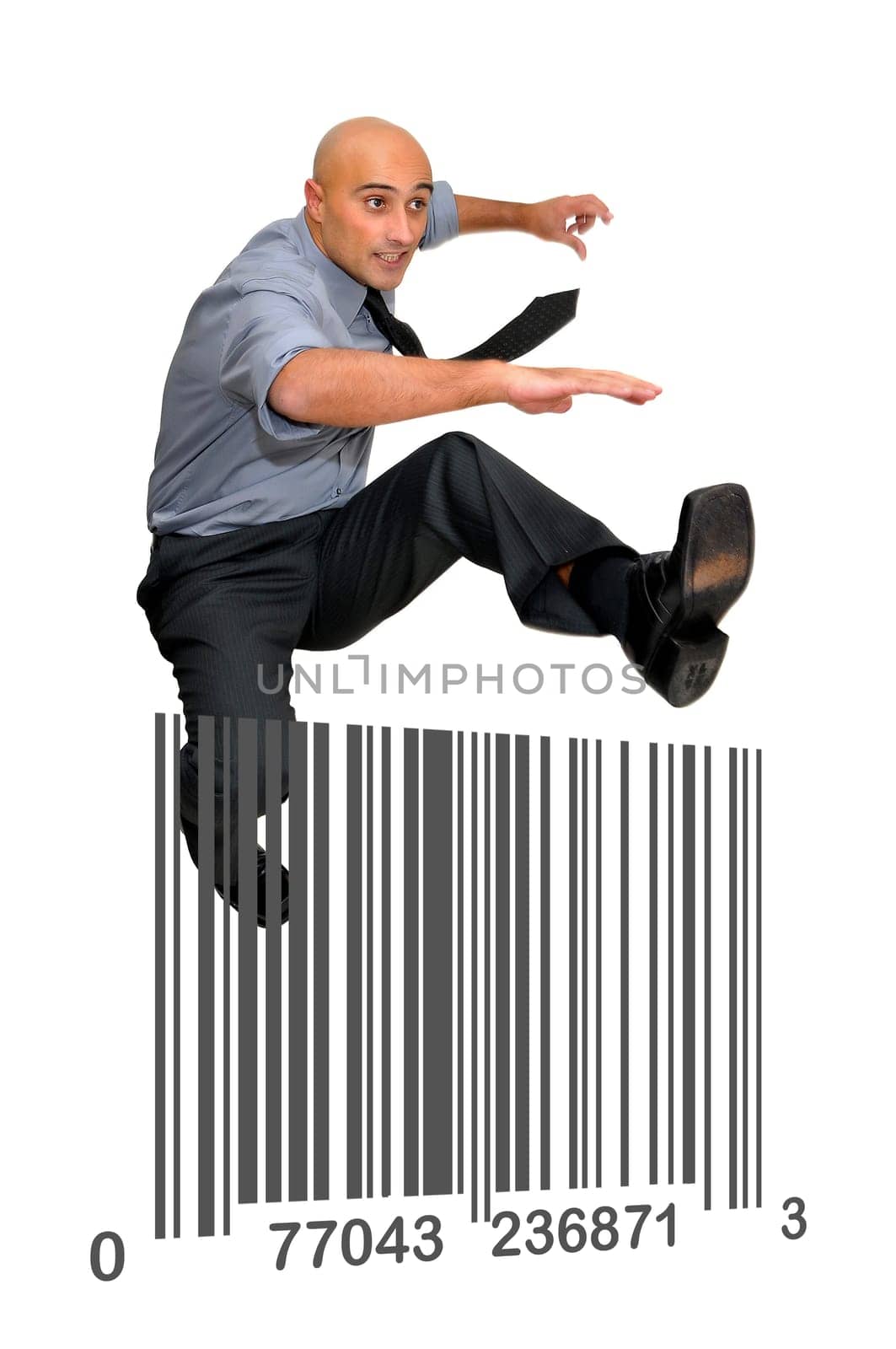 Businessman jumping over books isolated in white