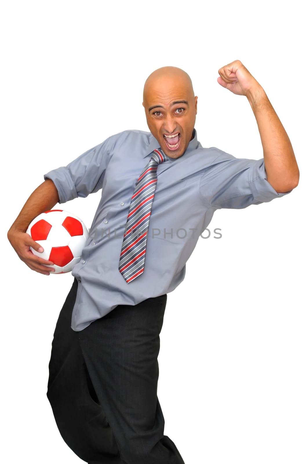 Businessman with a soccer ball isolated in white