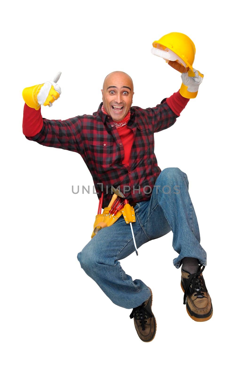 Happy construction worker jumping isolated in white