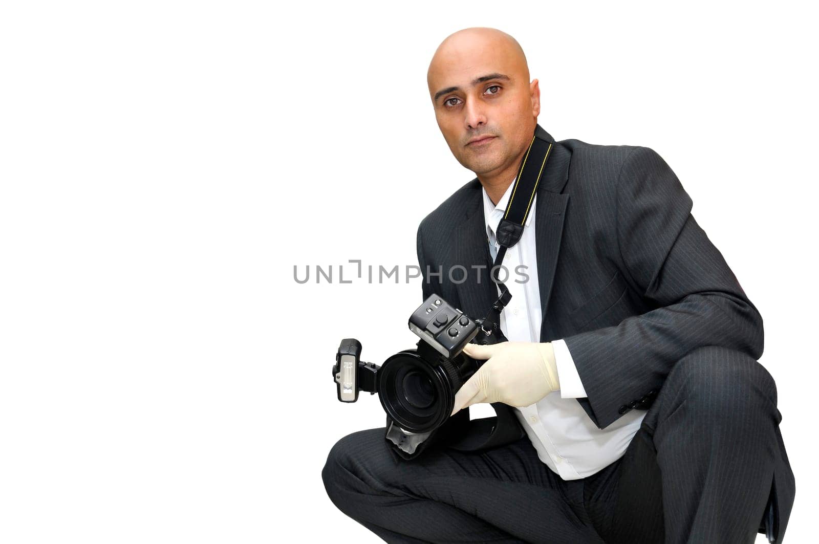 Police CSI investigator with gloves and camera