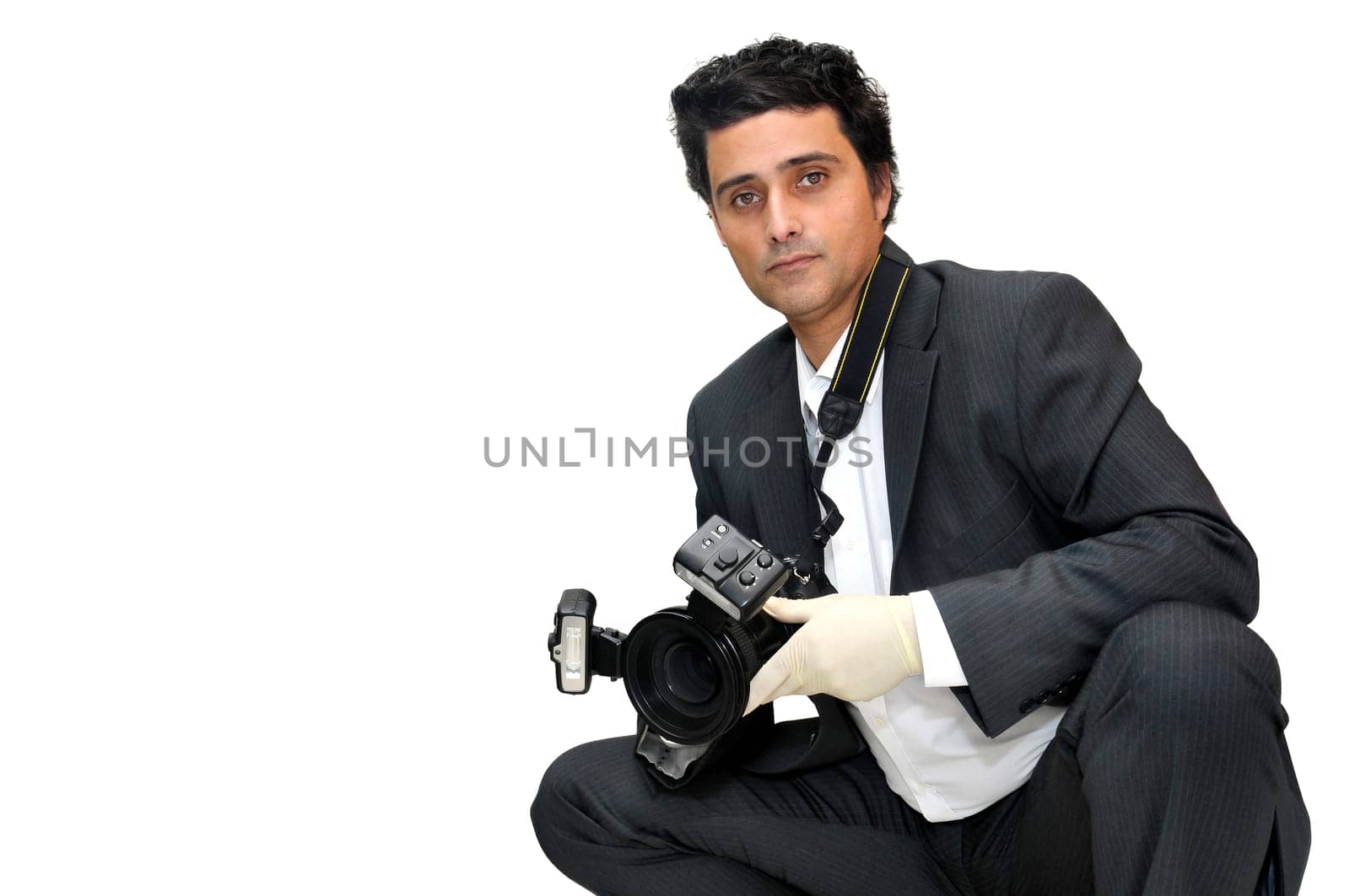 Police CSI investigator with gloves and camera