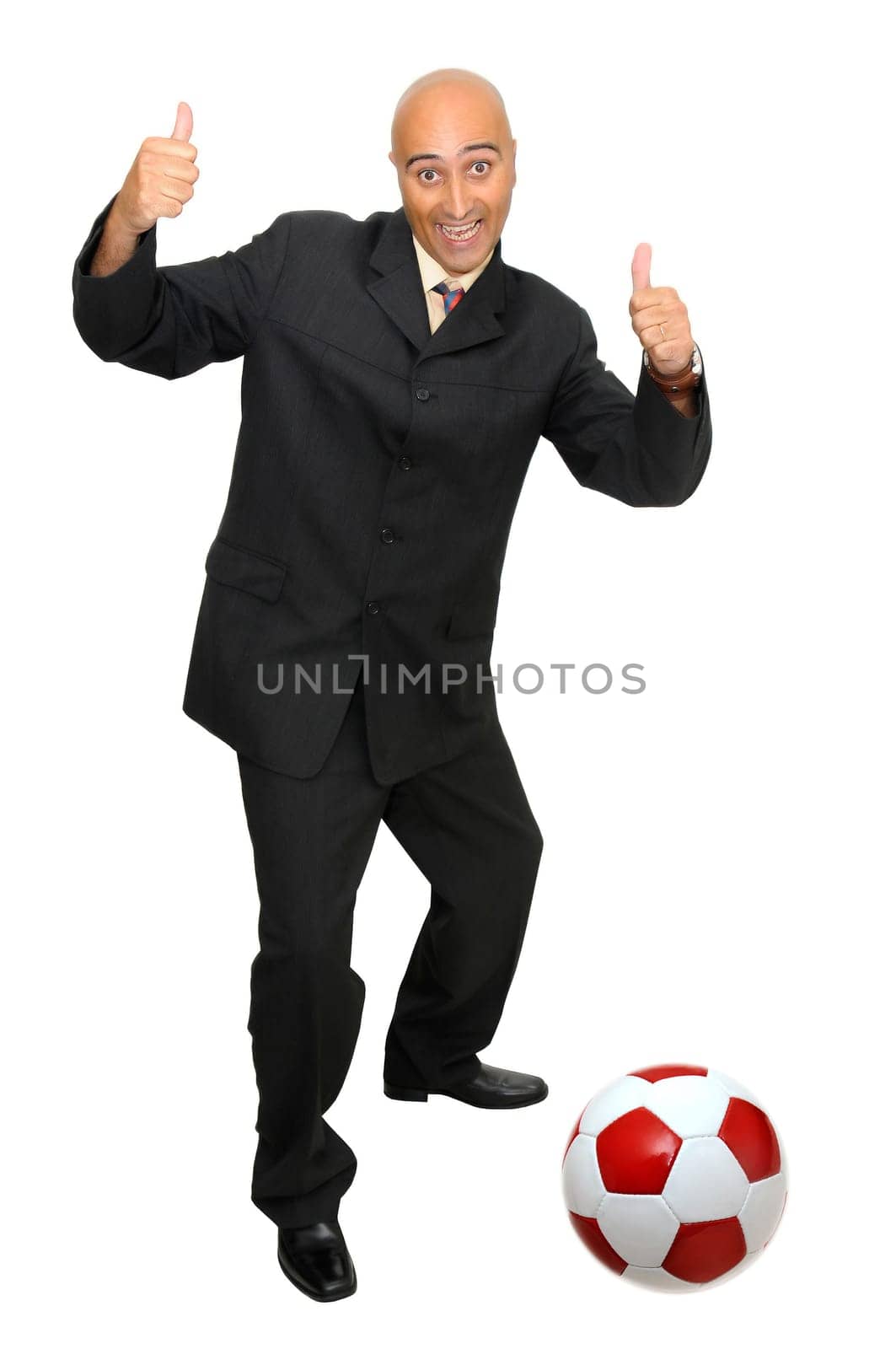 Businessmanwith a soccer ball isolated in white
