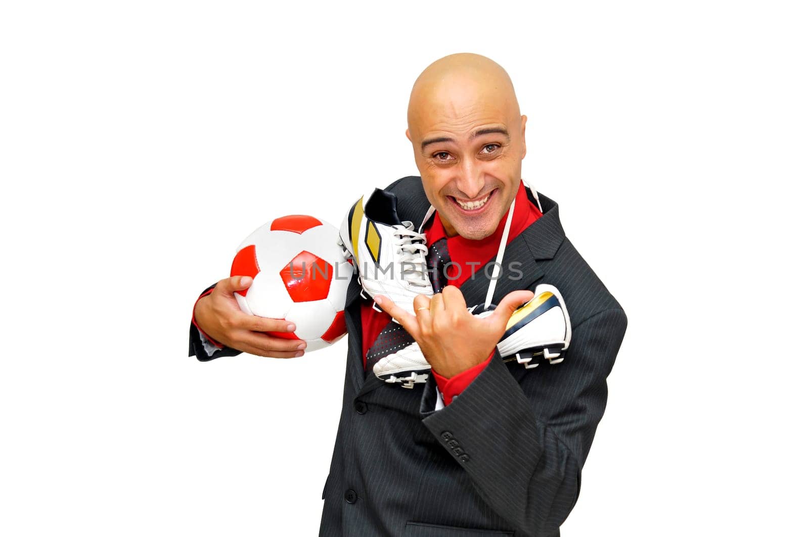 Businessman with soccer ball isolated in white