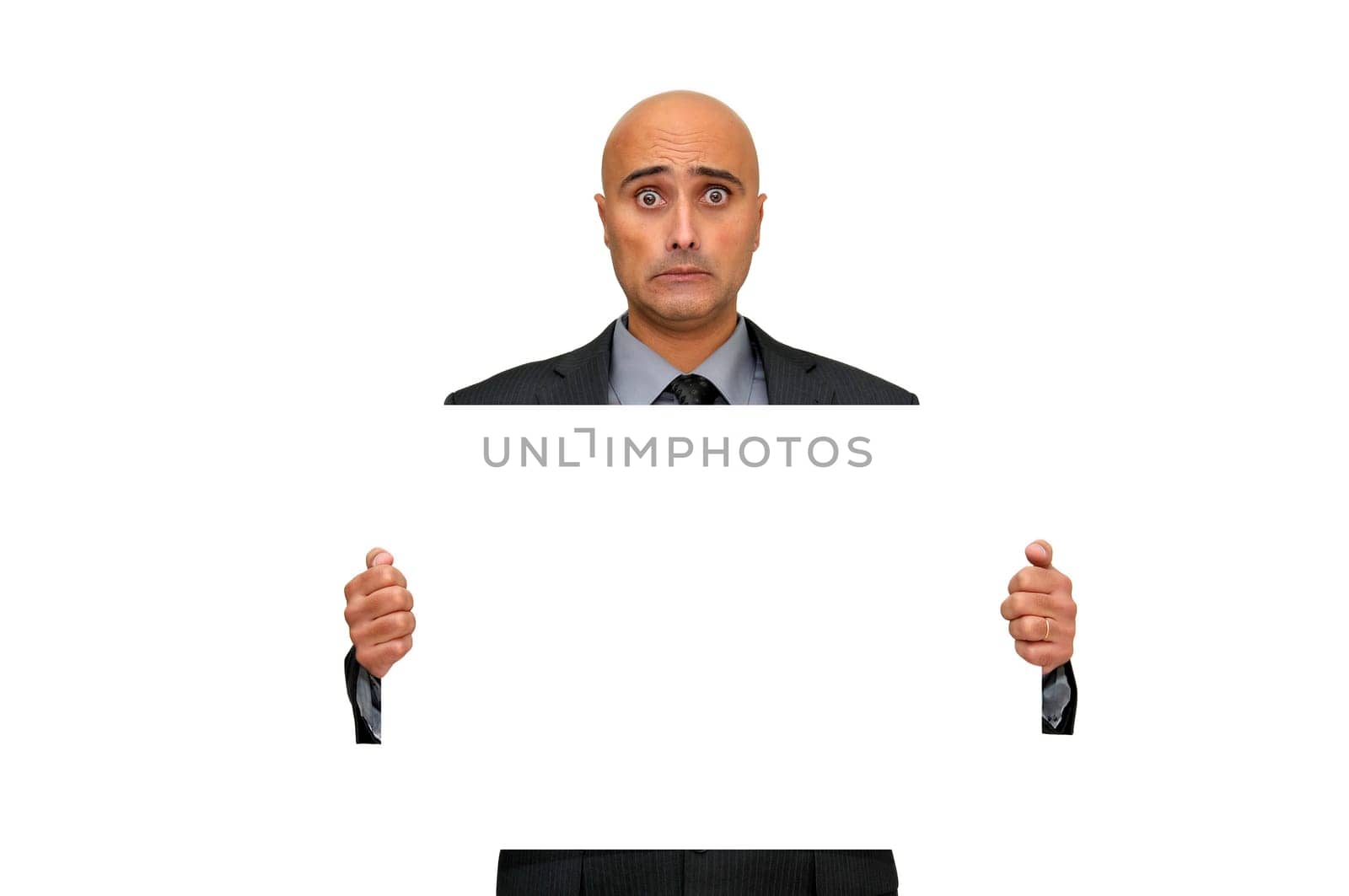 Businessman with blank card and sad face isolated in white