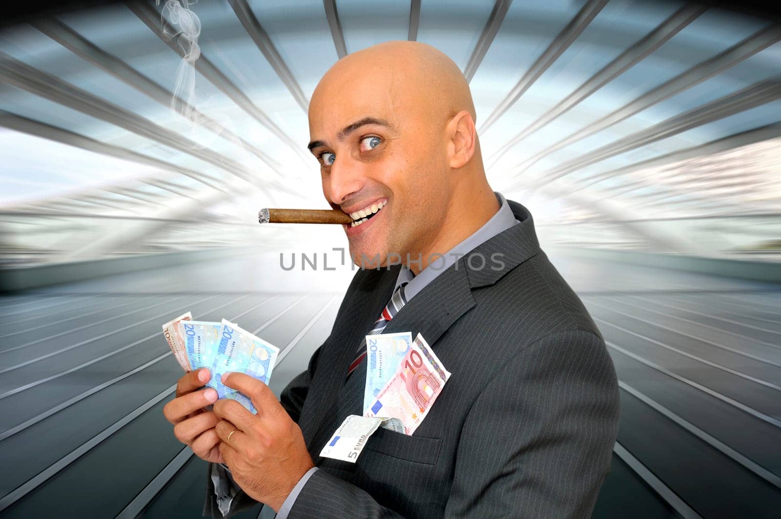 Businessman with money and a cigar
