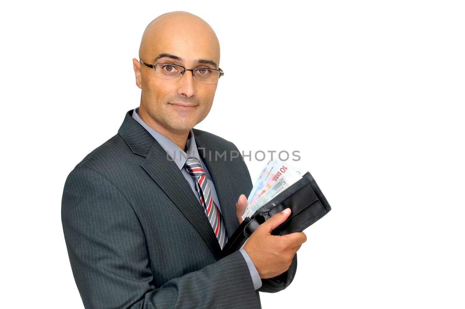 Happy businessman with money