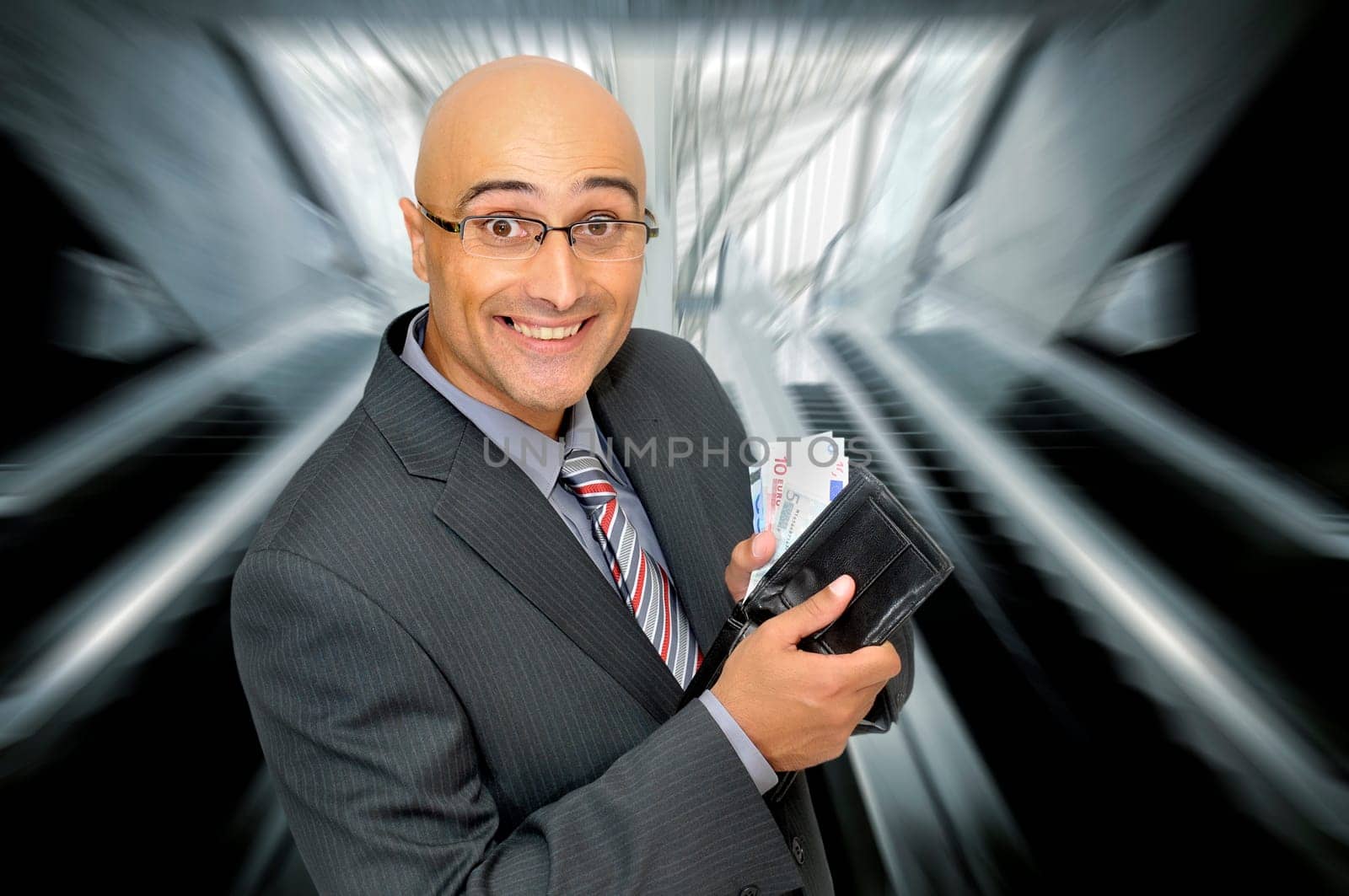 Happy businessman with money