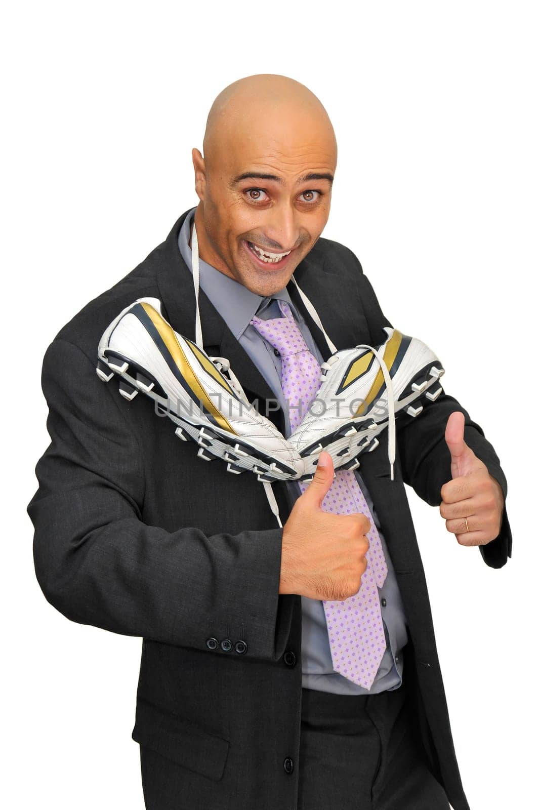 Businessman with a soccer ball isolated in white