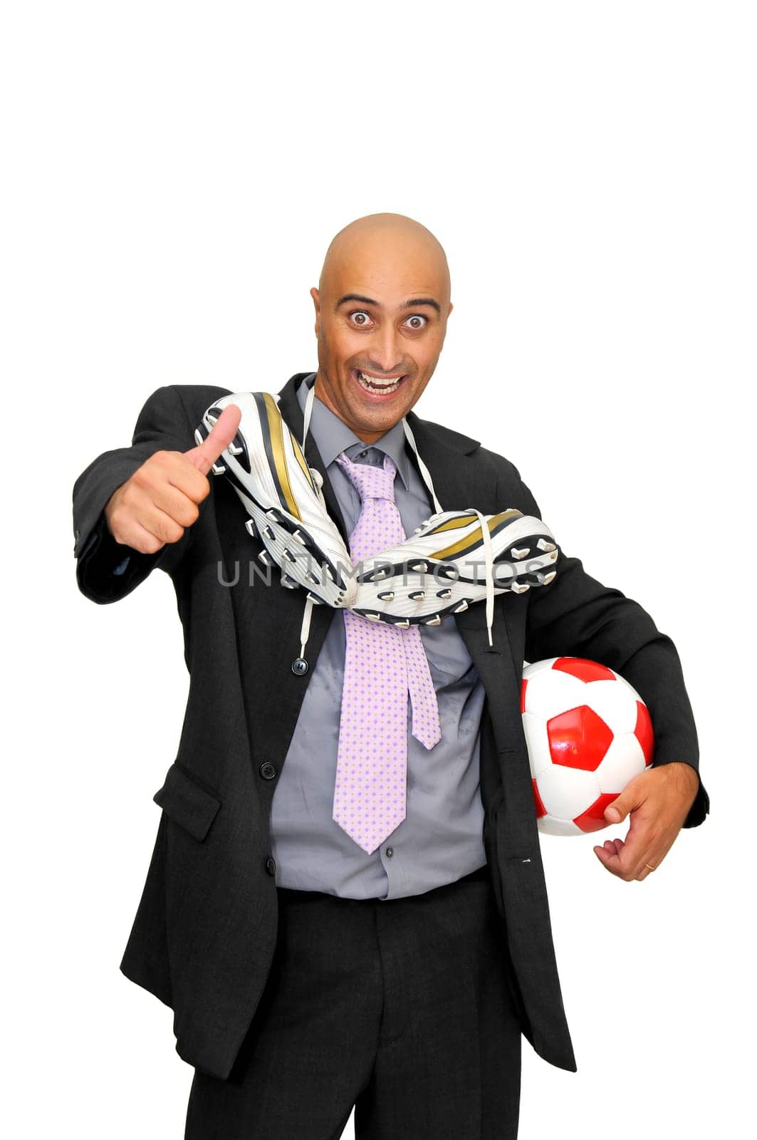 Businessman with a soccer ball isolated in white