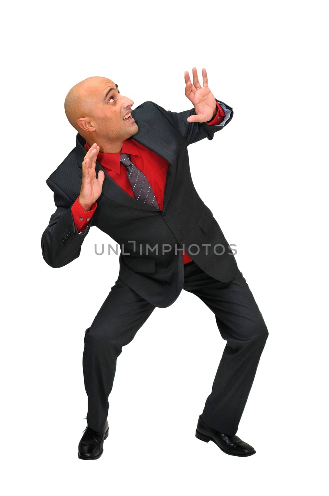Scared businessman isolated in white