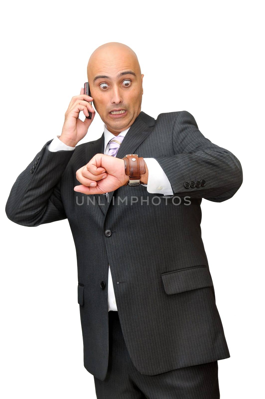 Businessman with cellphone isolated in white