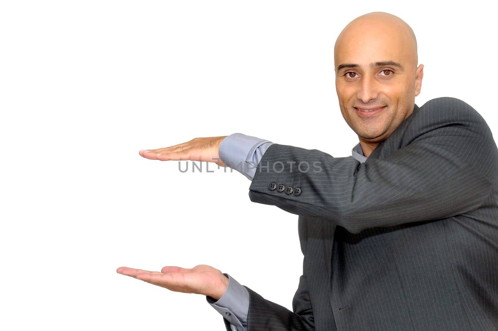 Happy businessman with hands up isolated in white