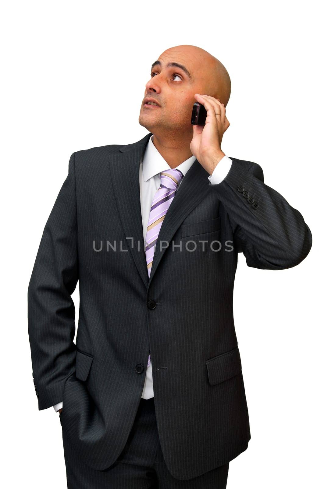 Businessman with cellphone isolated in white