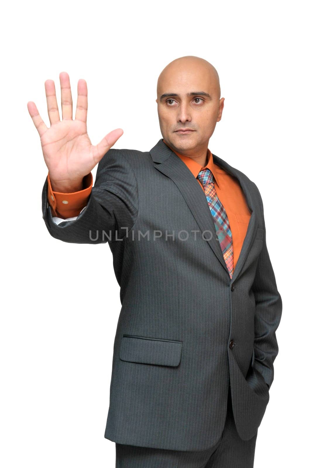 Businessman isolated in white with left hand raised