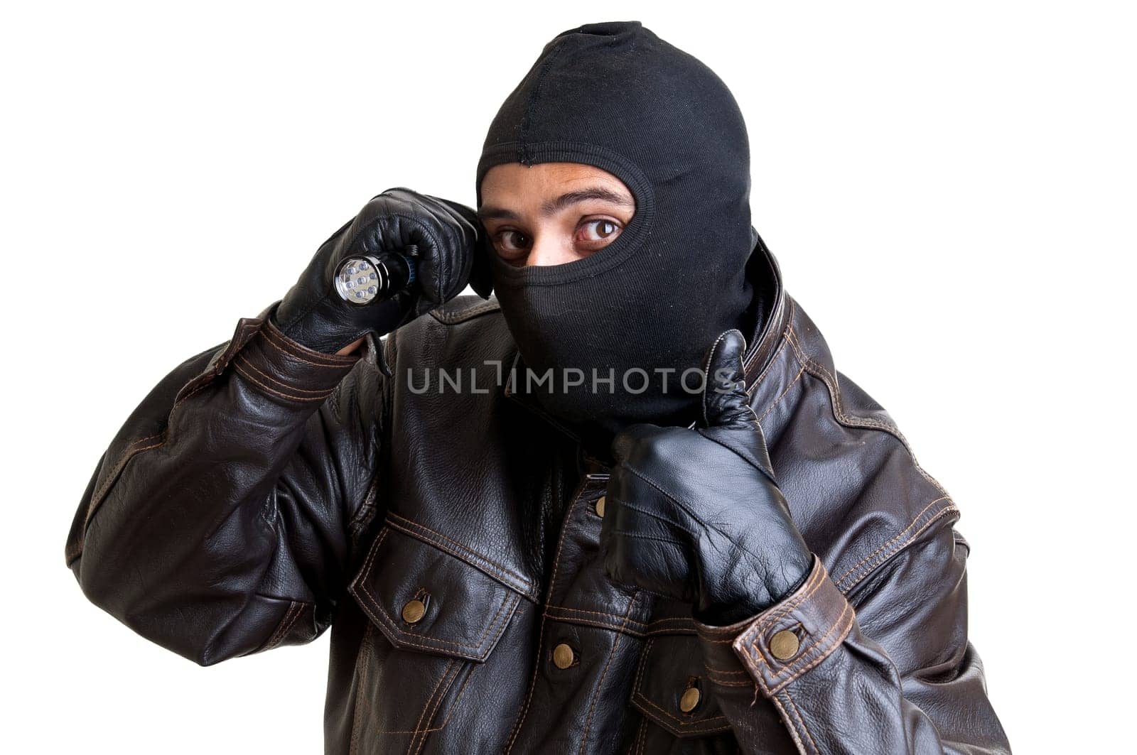 Burglar with flashlight isolated in white