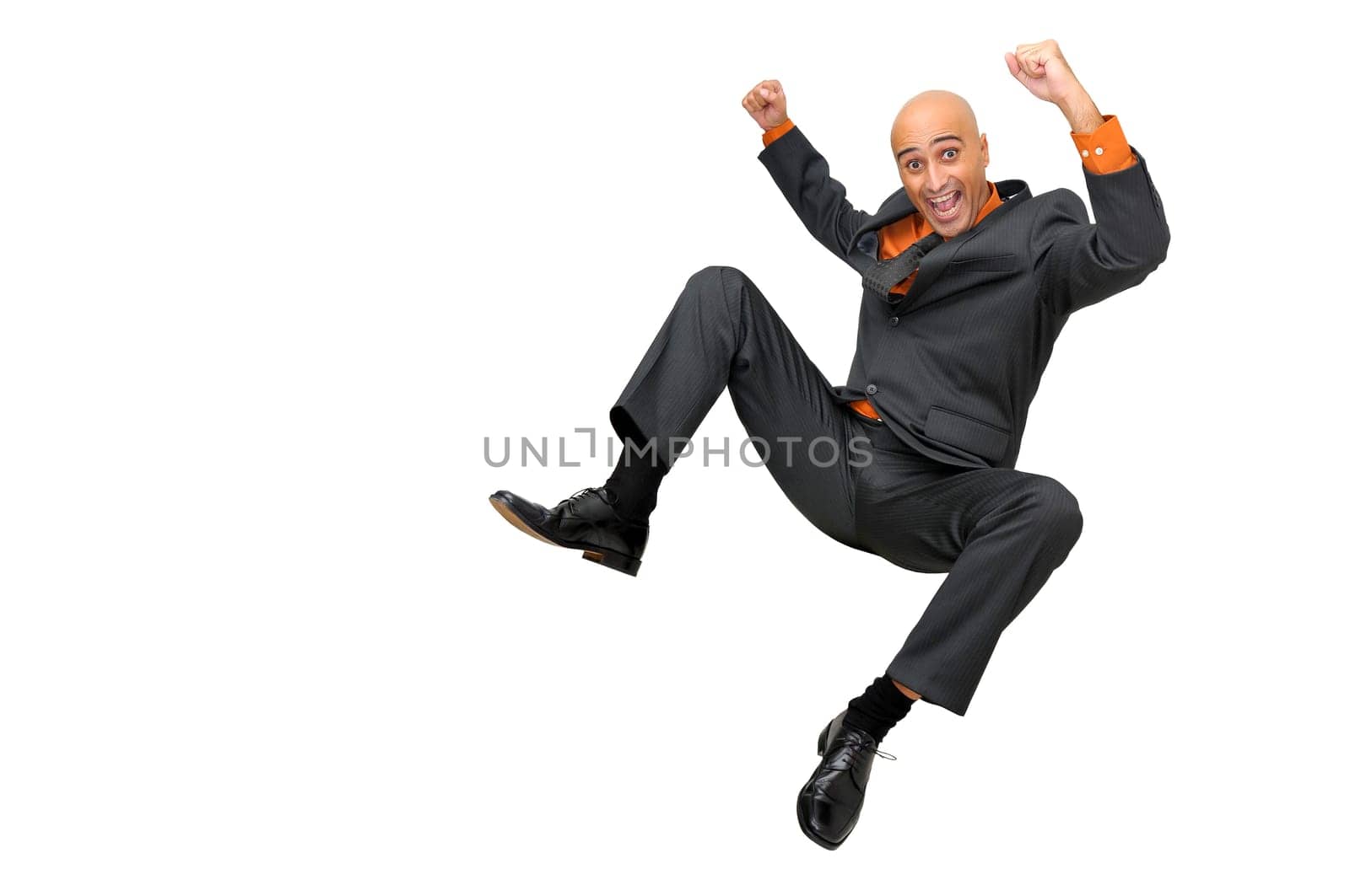 Happy businessman jumping high isolated in white
