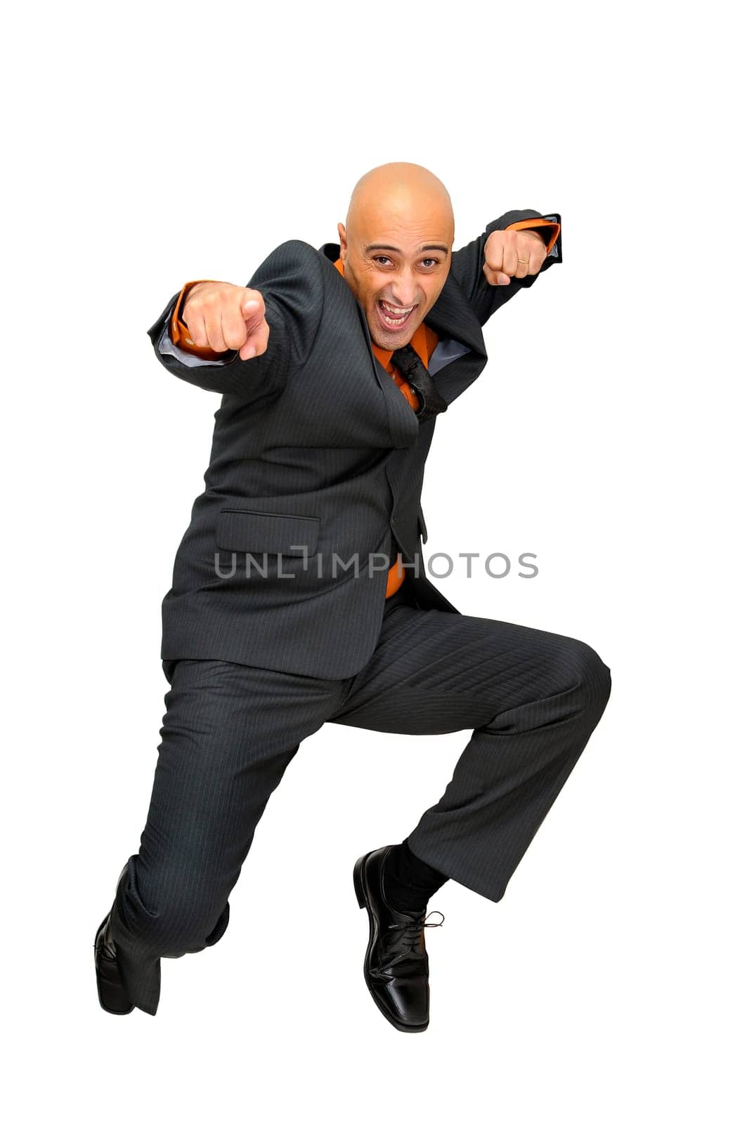 Happy businessman jumping high isolated in white