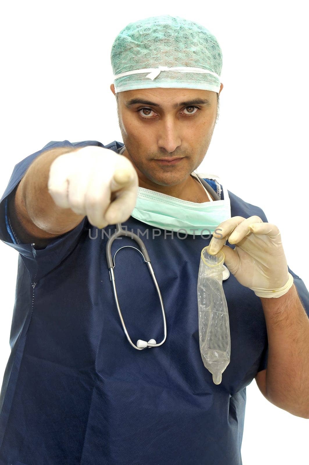 Doctor with condom isolated in white