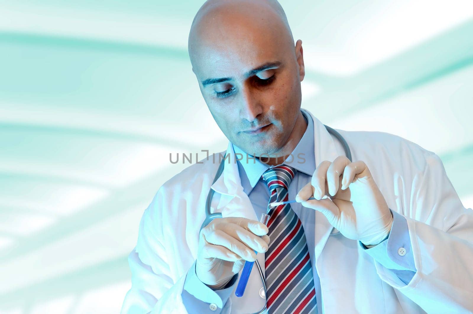 Investigator with vial in his lab