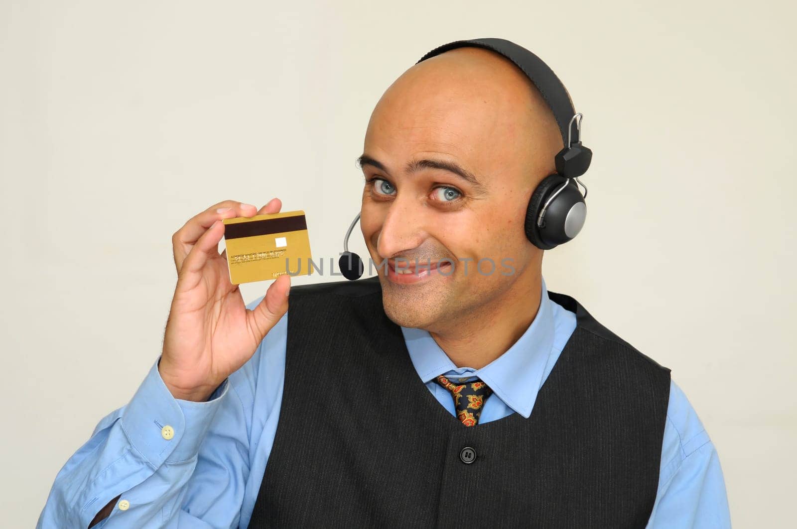 Businessman with headset isolated in white