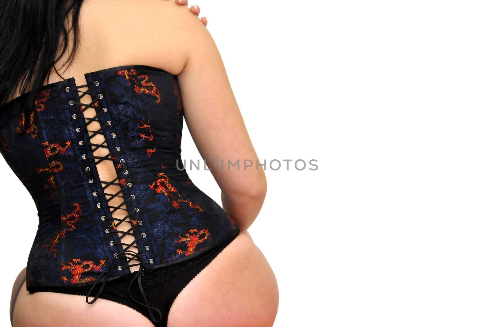 Sexy woman with corset and stocking isolated in white