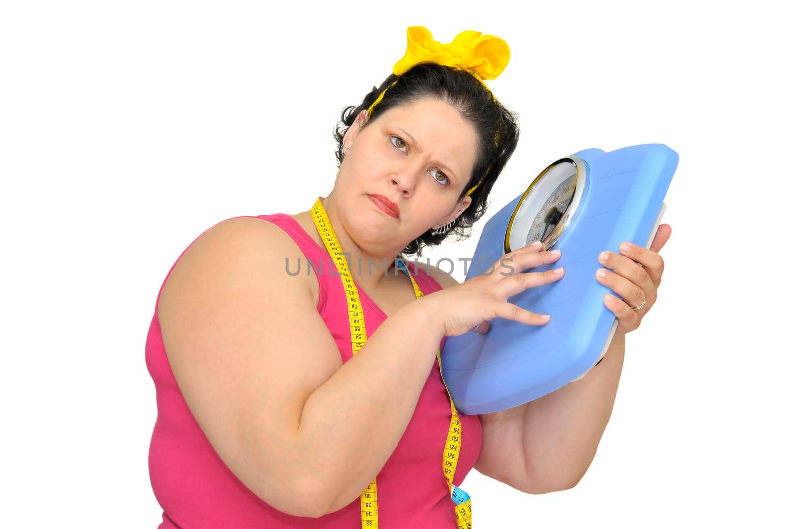 Large girl with scale, isolated in white