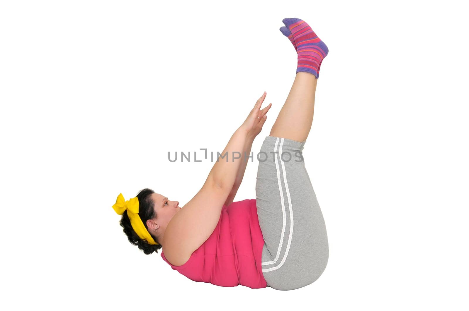 Large girl doing fitness exercises isolated in white