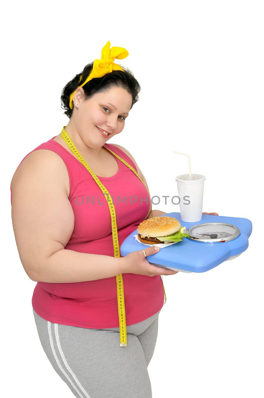 Large girl with hamburger isolated in white