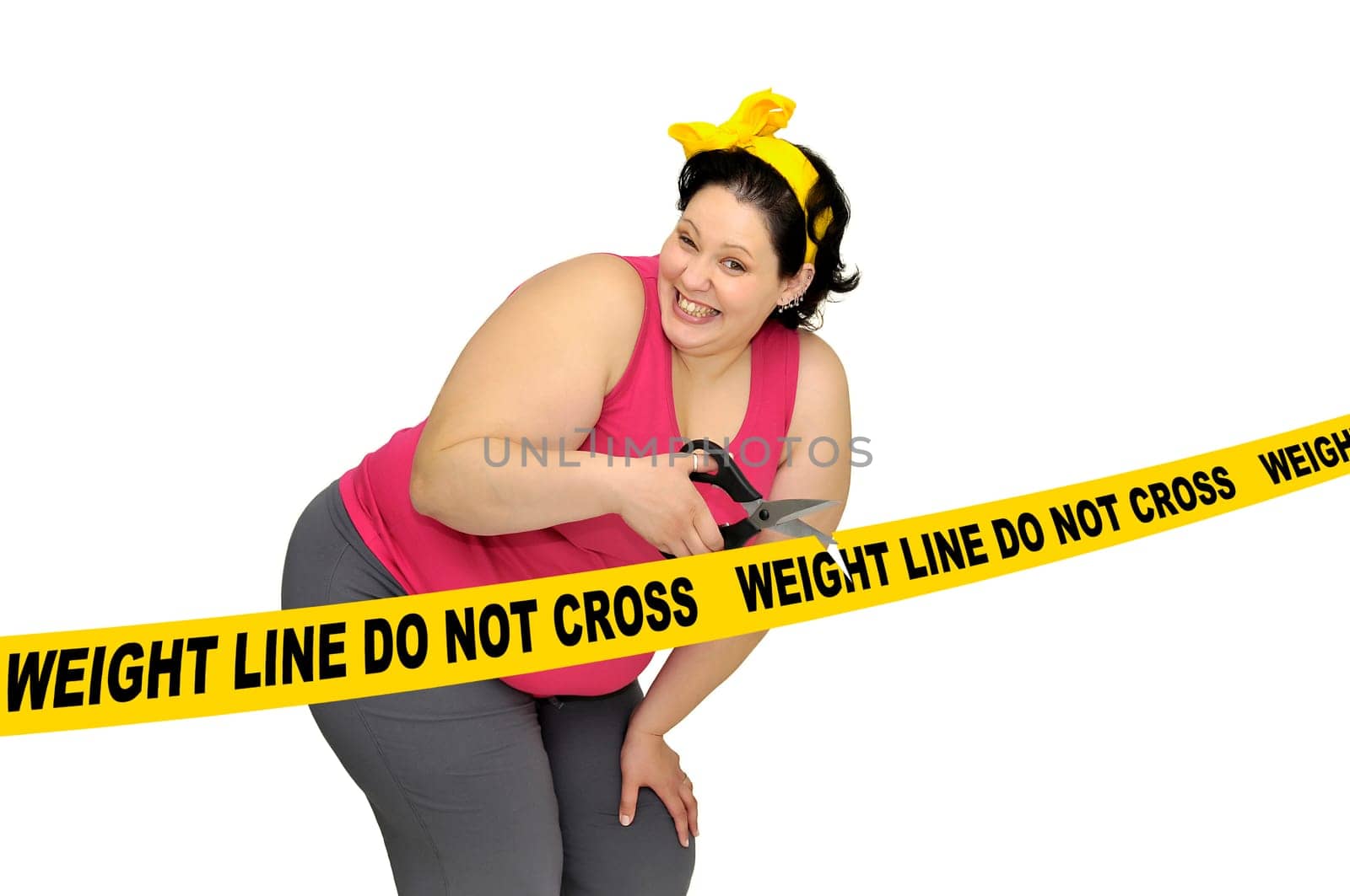 Large girl isolated in white with scissors and yellow tape