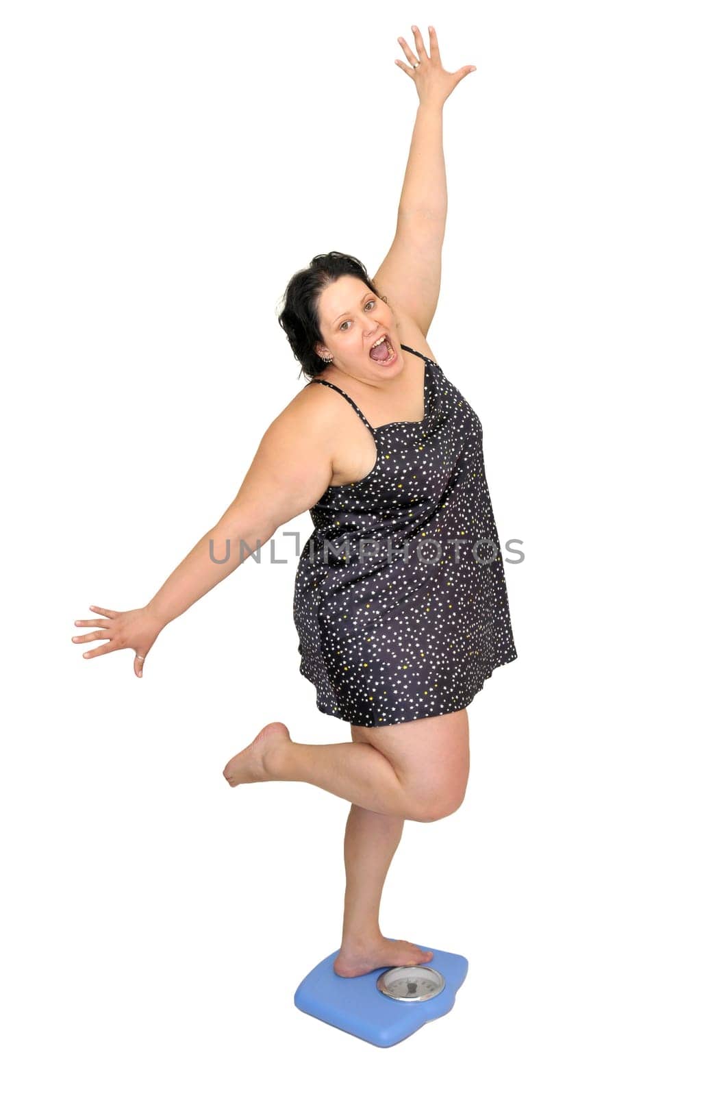Large young woman in a scale