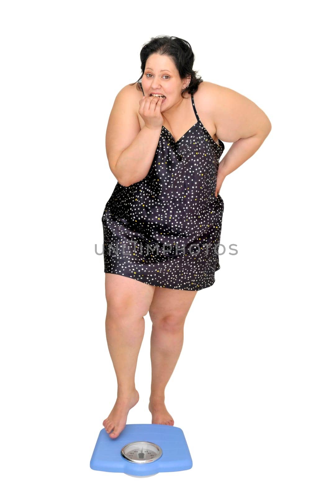 Large young woman in a scale