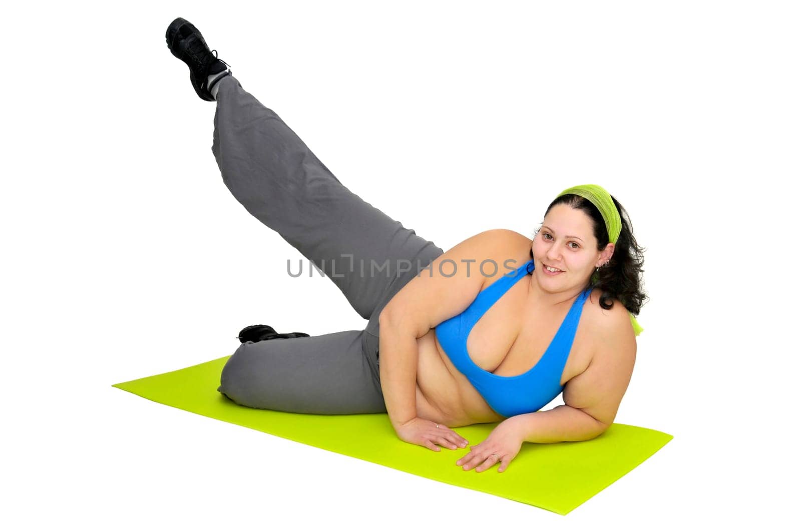 Large girl exercising isolated in white