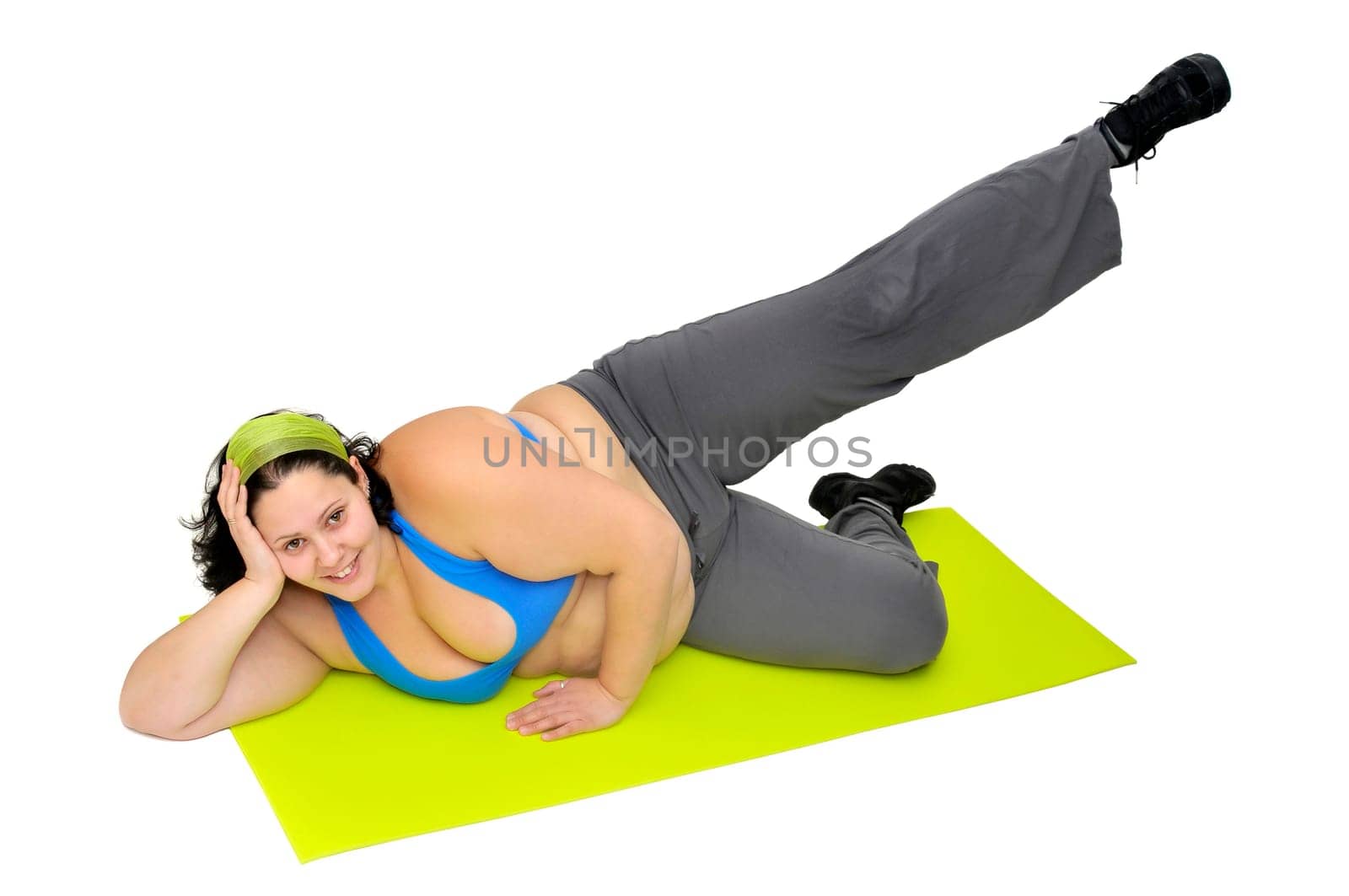 Large girl exercising isolated in white