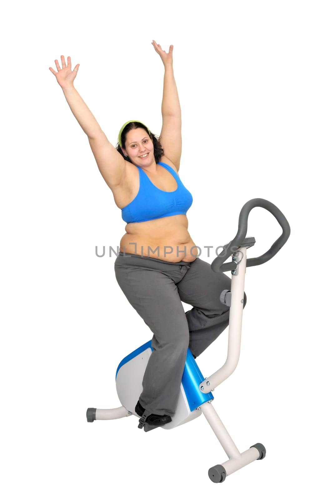 Large girl exercising isolated in white