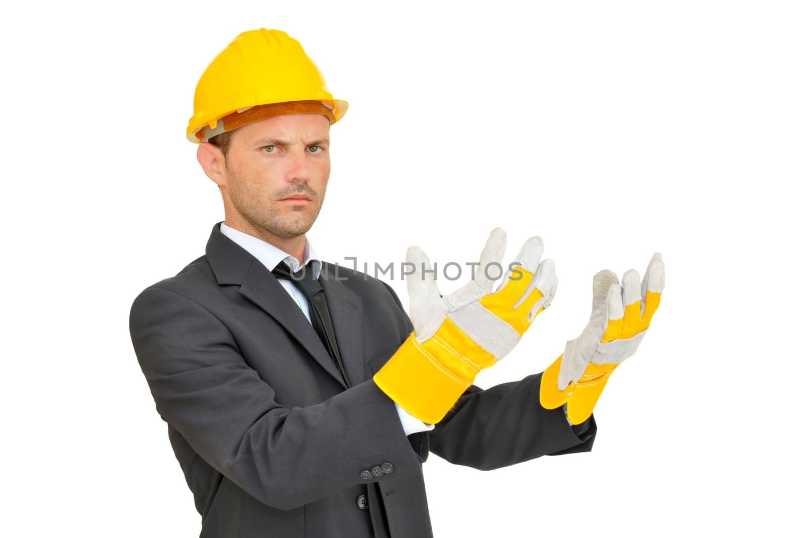 Engineer with hat and gloves isolated in white