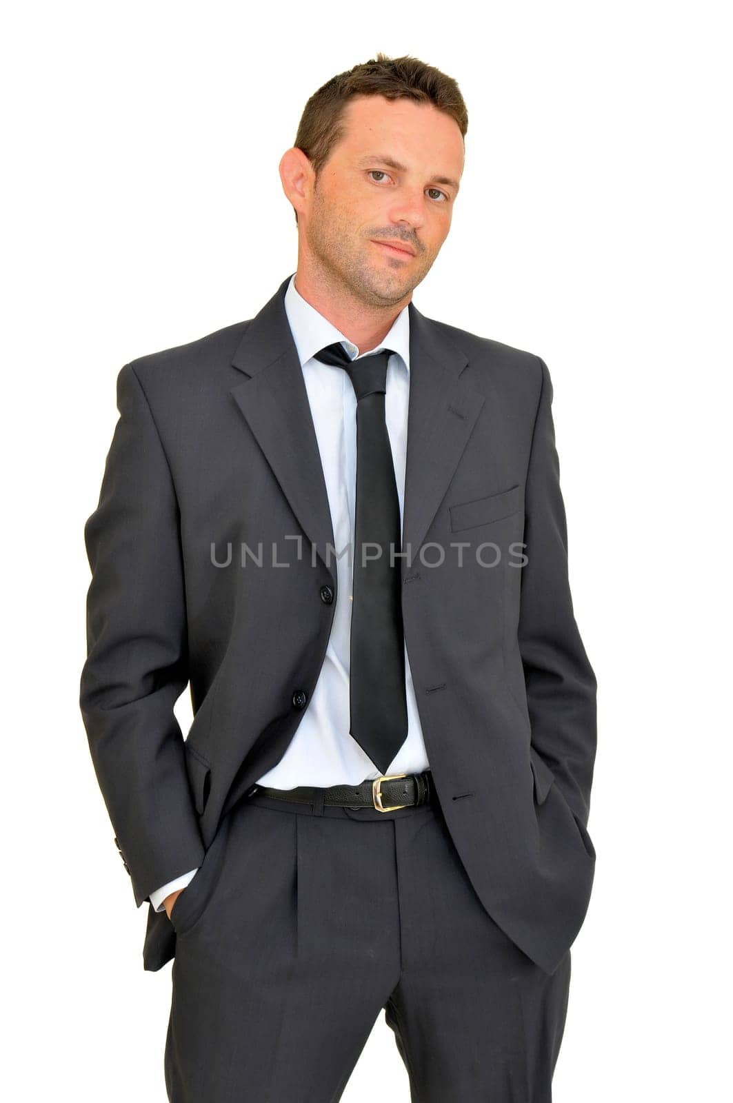 Young businessman posing isolated in white