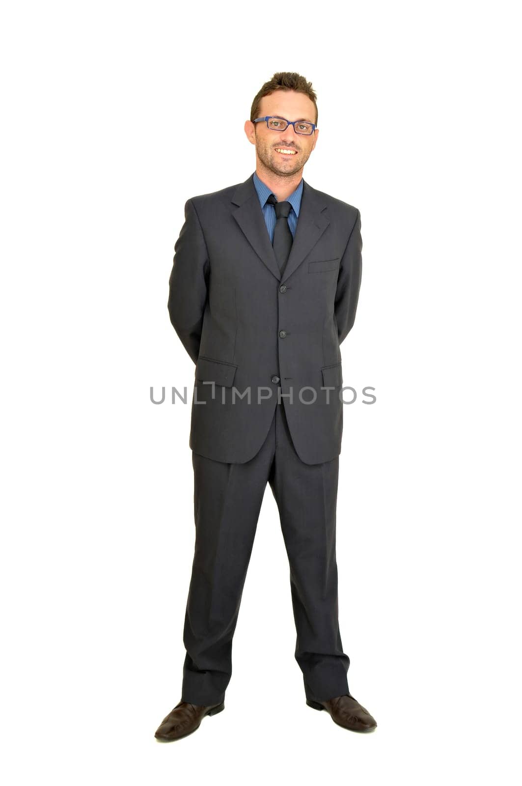 Young businessman posing isolated in white