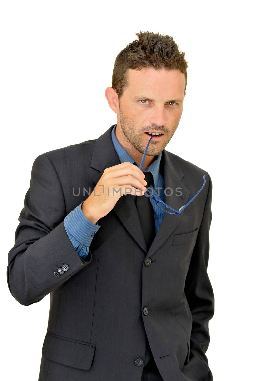 Young businessman posing with glasses isolated in white