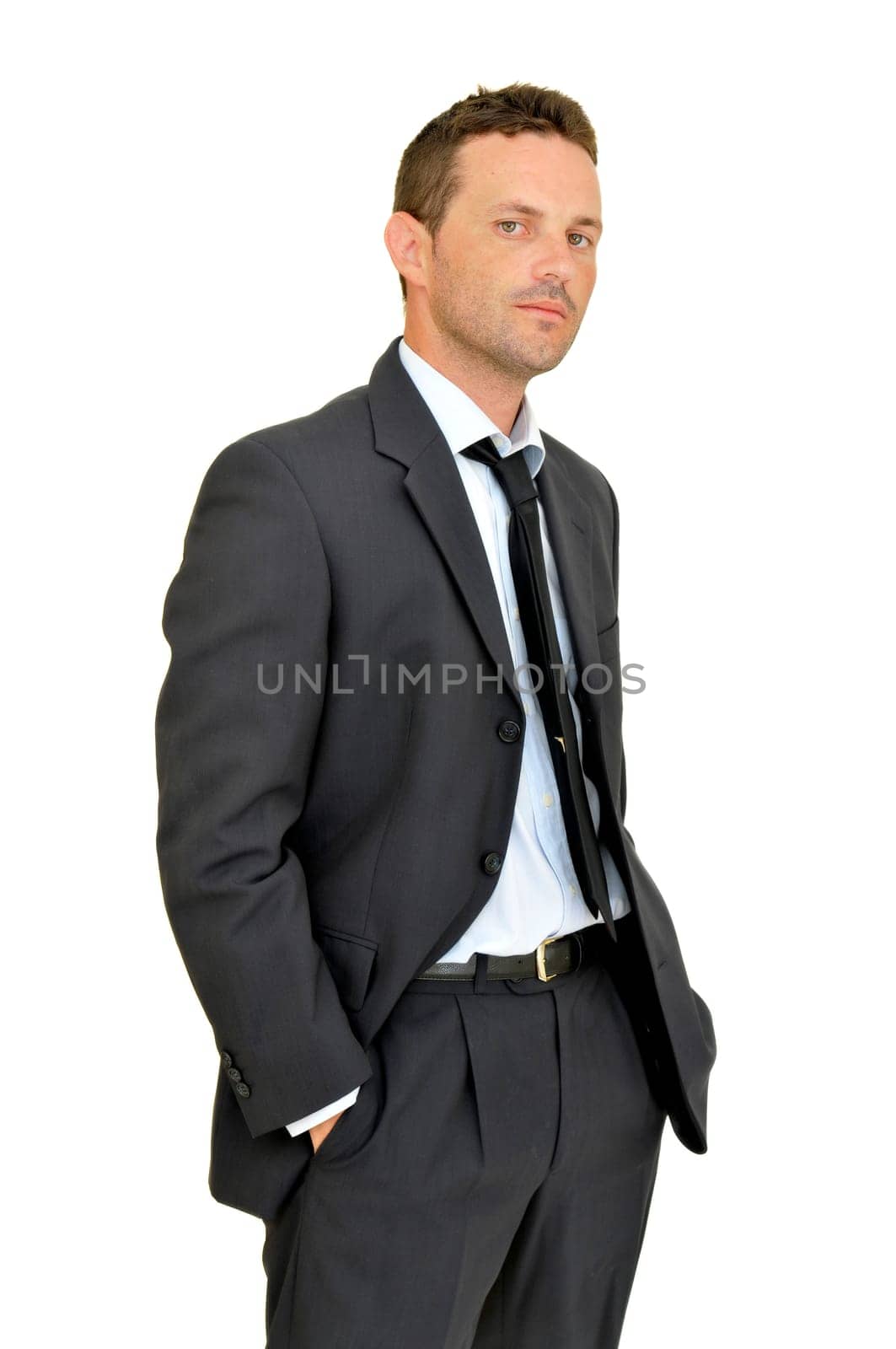 Young businessman posing isolated in white