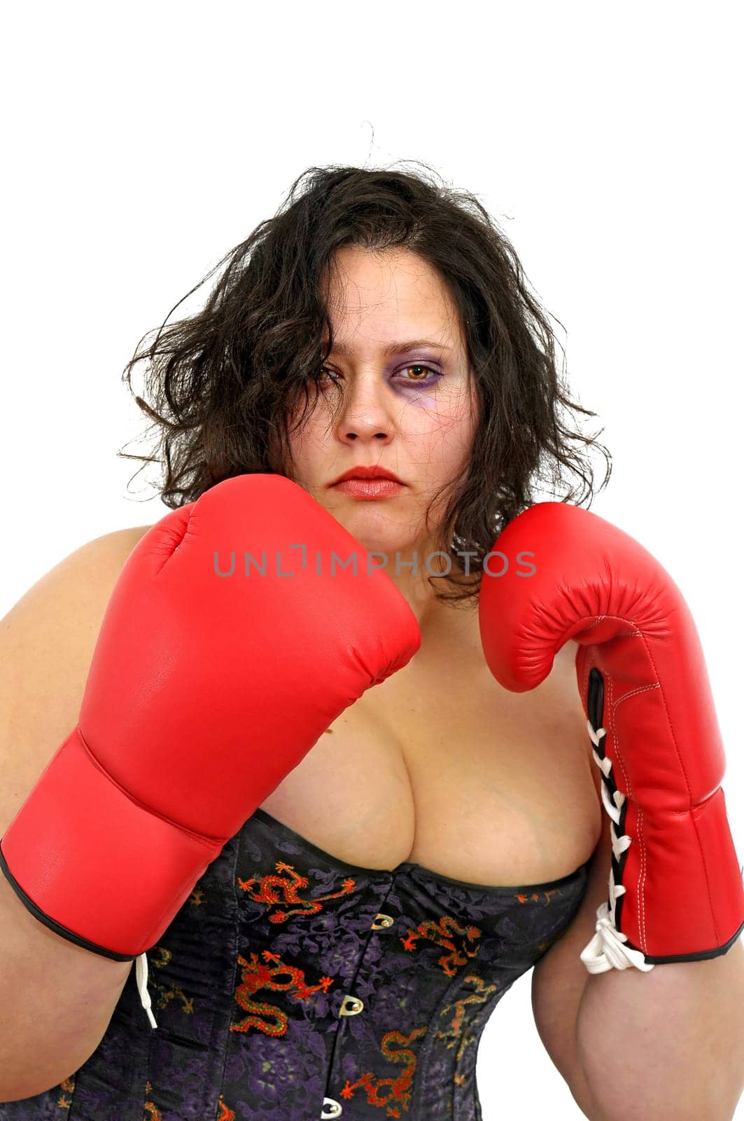 Beautiful large woman with boxing gloves isolated in white