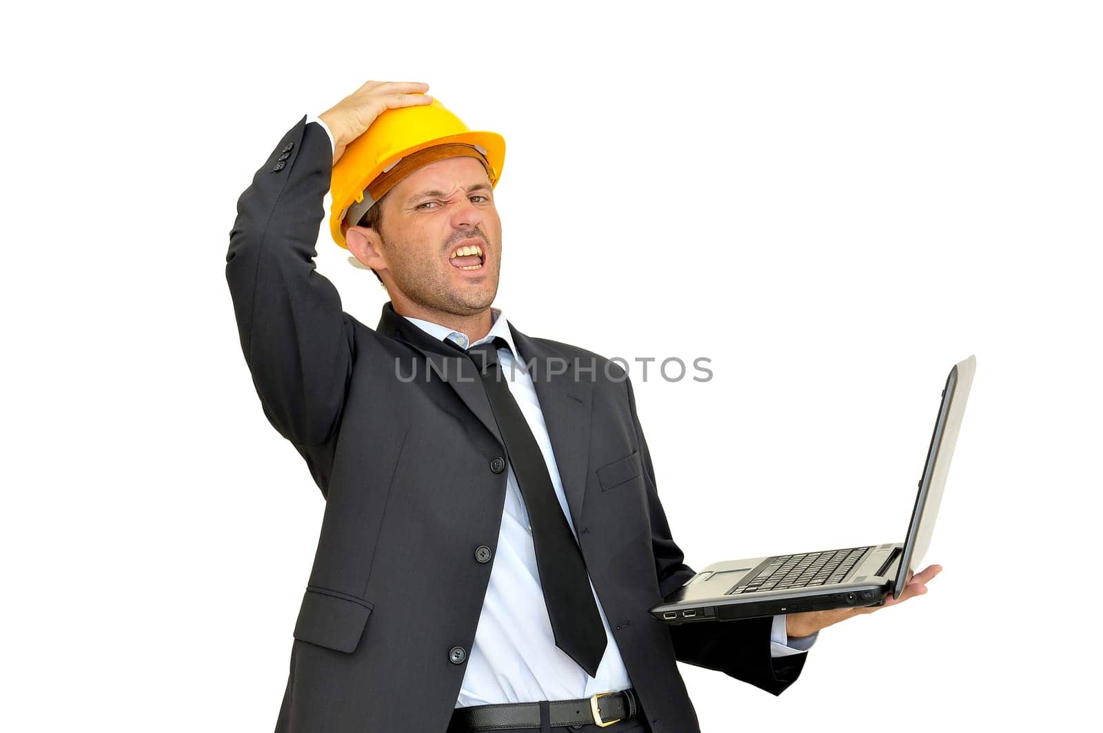 Engineer with hat and laptop isolated in white