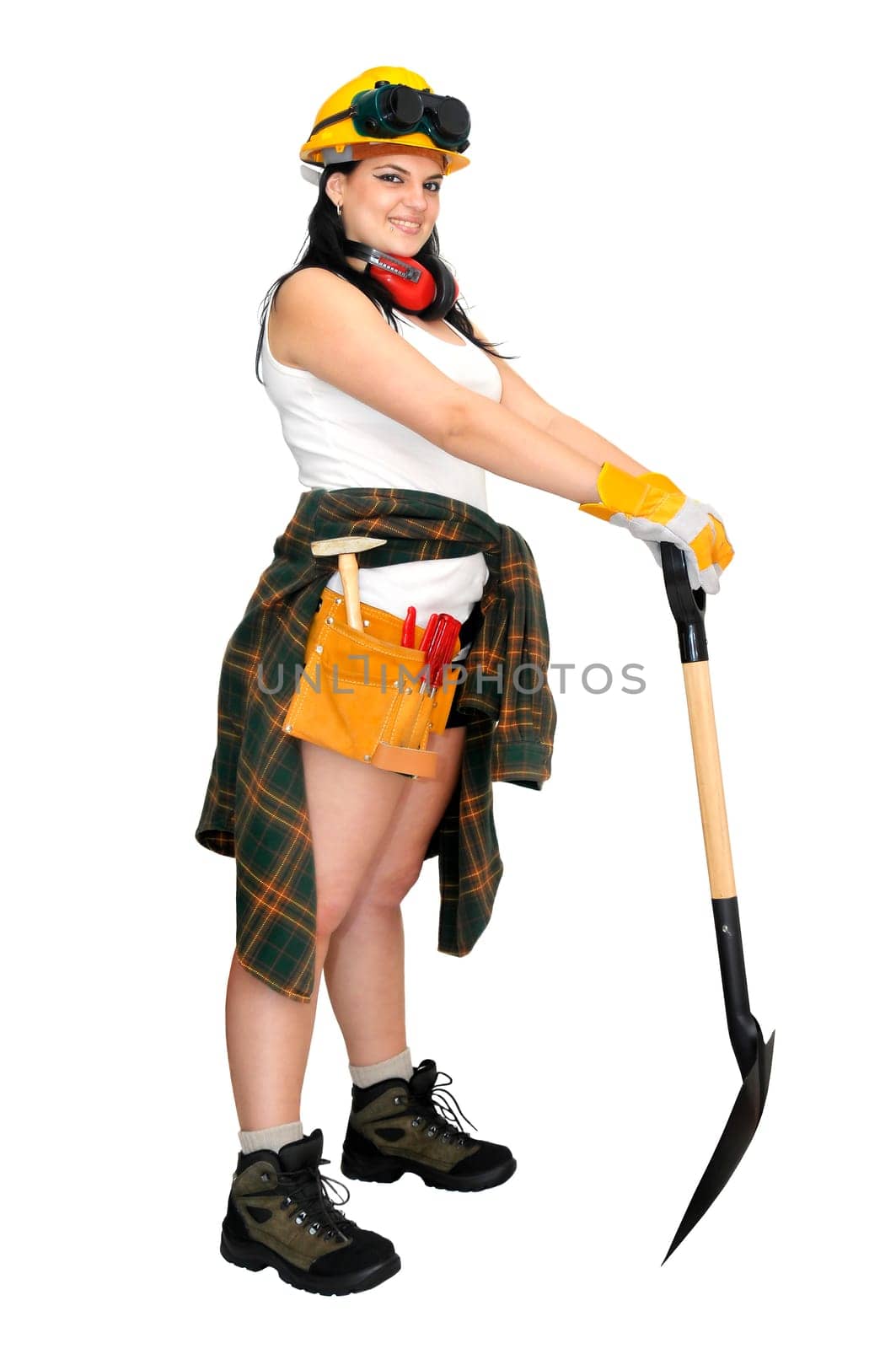 Young sexy construction worker girl with a shovel isolated in white