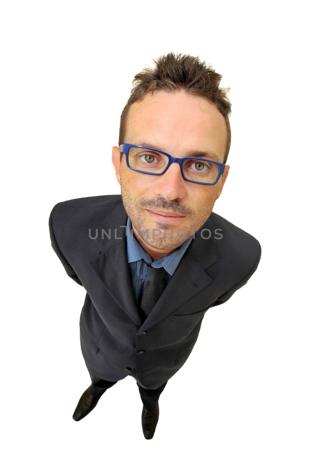 Young businessman posing against a white background
