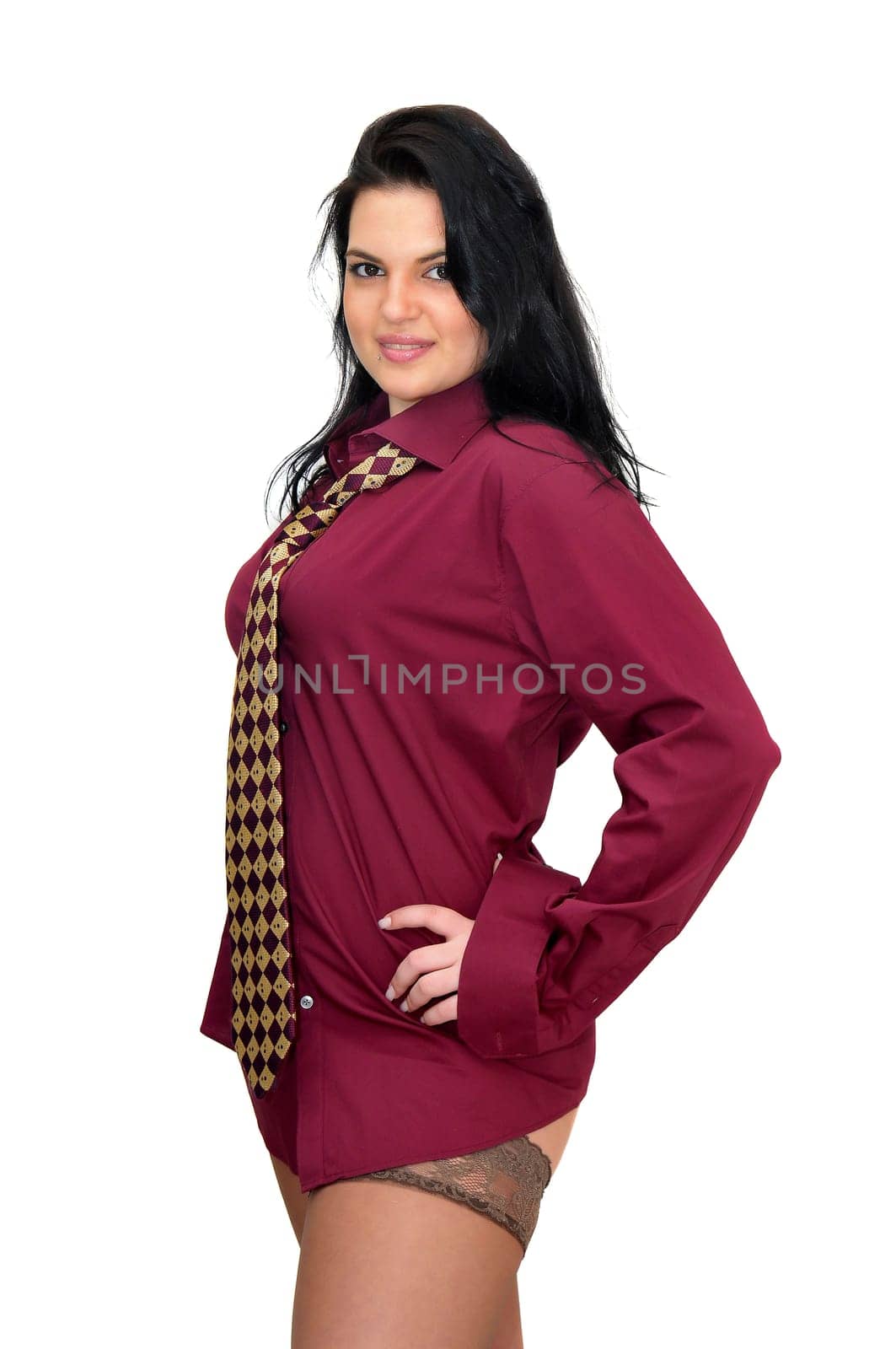 Sexy businesswoman with tie and stockings isolated in white