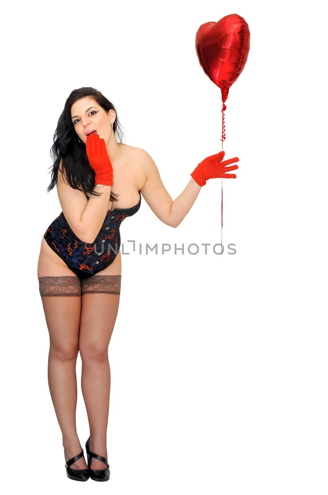Sexy woman with red balloon isolated in white