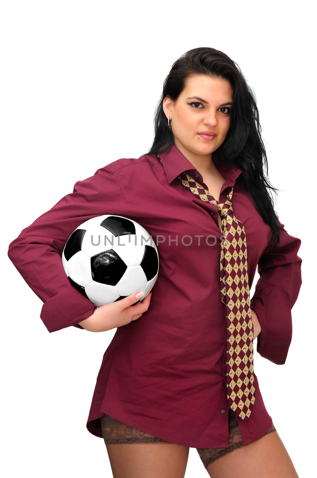 Sexy businesswoman with soccer ball isolated in white
