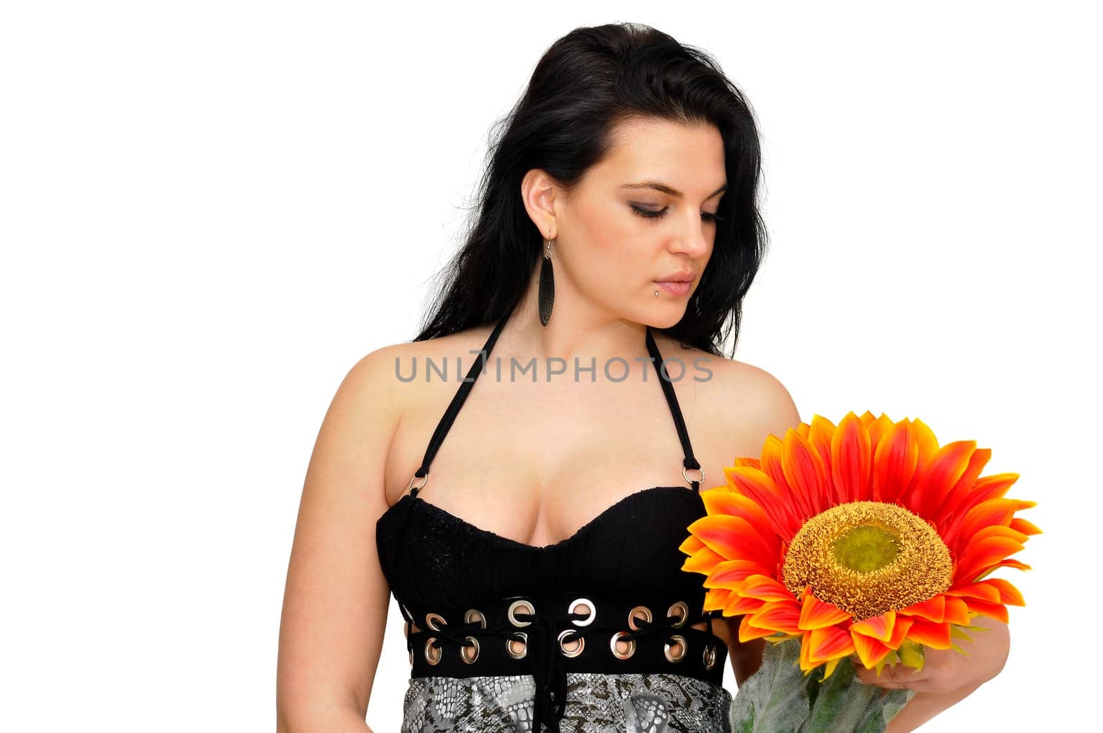 Sexy woman with flower isolated in white