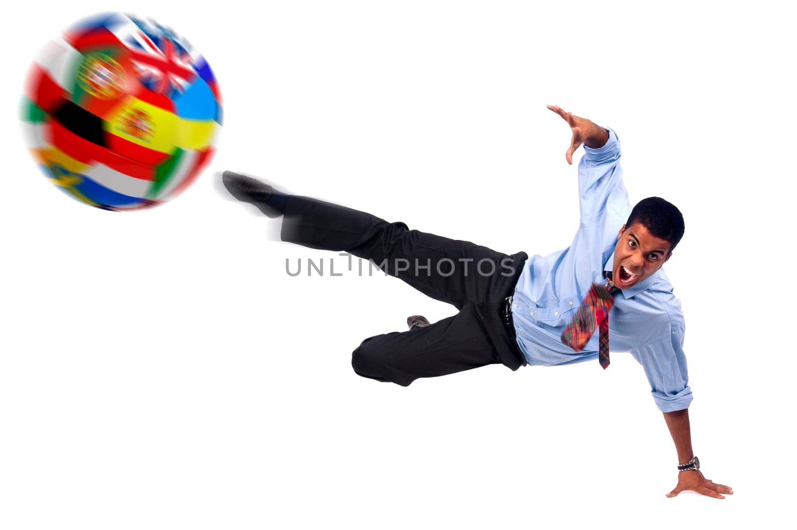 Businessman playing soccer isolated in white