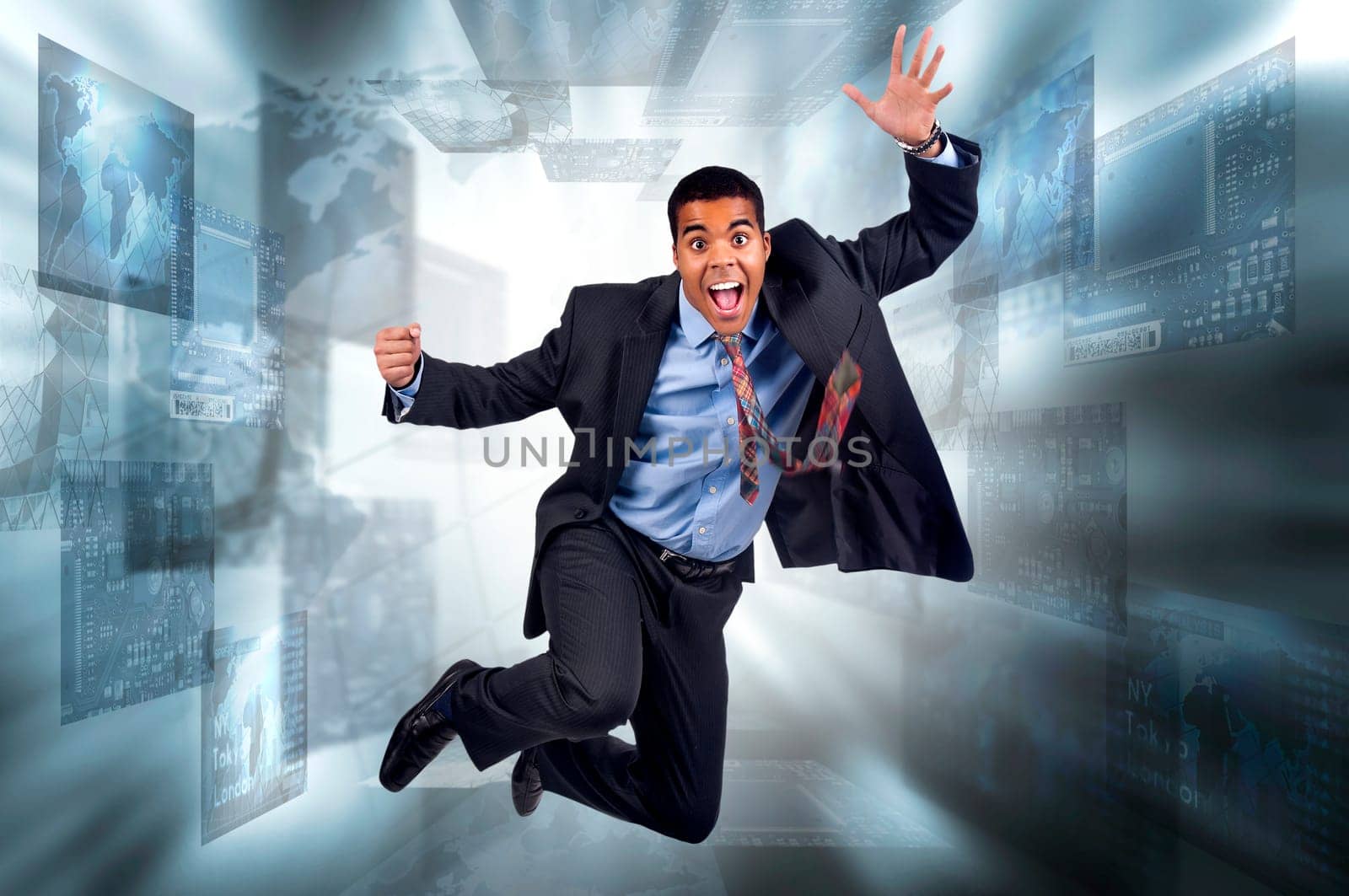 Happy businessman jumping in a digital screen background