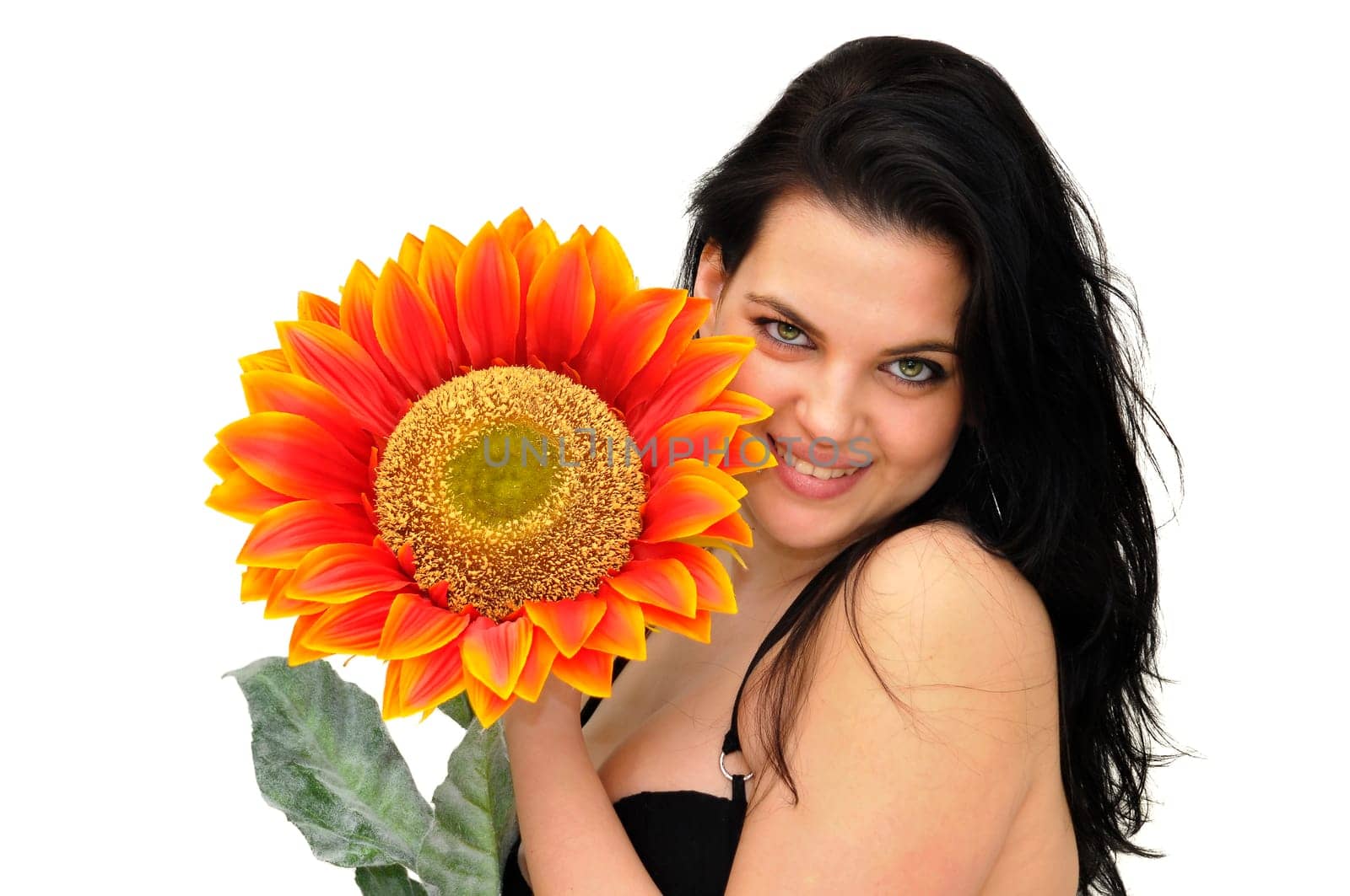 Sexy woman with flower isolated in white